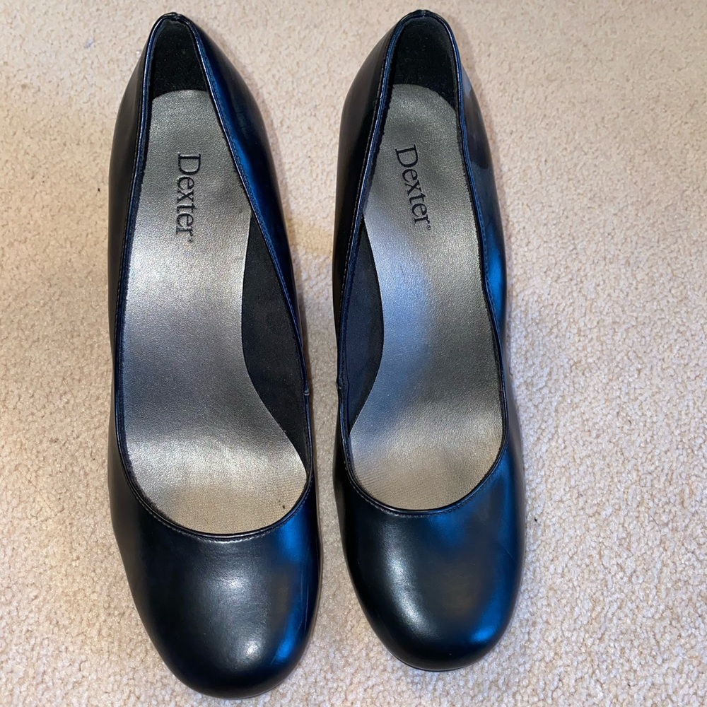 Black pleather heels. Worn only once.